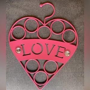 Pink heart shaped scarf holder for closet